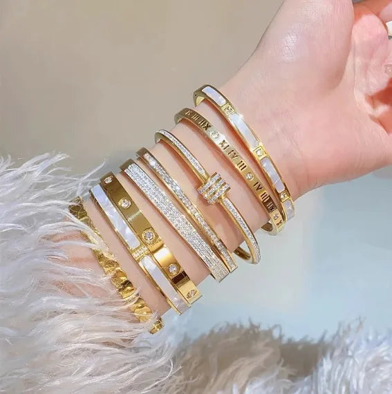 Bracelet jonc acier inoxydable doré femme résistant eau.