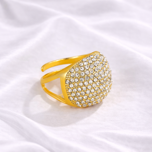 Bague bombée Éclara en acier inoxydable doré sertie de zirconiums scintillants