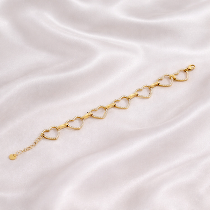 Bracelet cœurs femme en acier inoxydable doré avec maillons en forme de cœur sertis