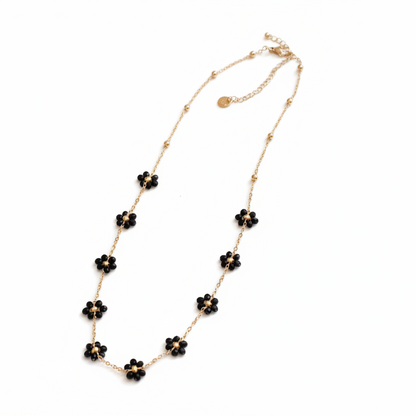Collier doré à fleurs noires en acier inoxydable 
, Noctéa – La Merveille Bijoux